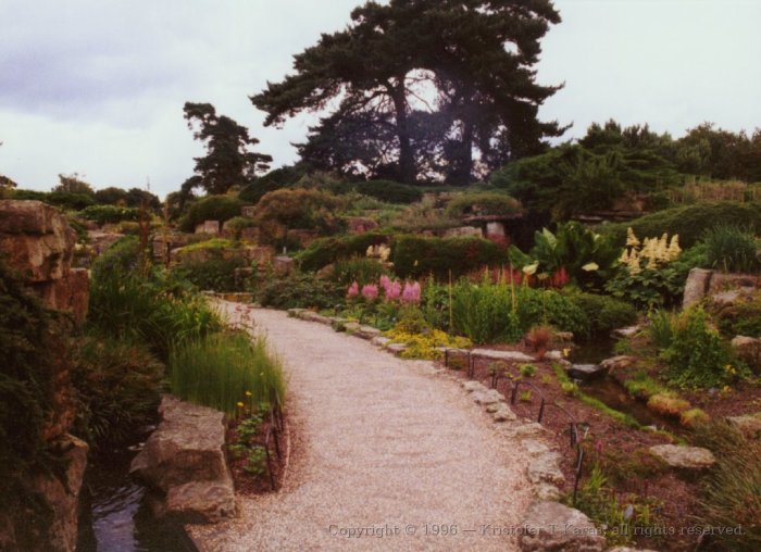 Garden walkway adjacent Princess of Wales Conservatory, Royal Botanical Gardens, Kew, England