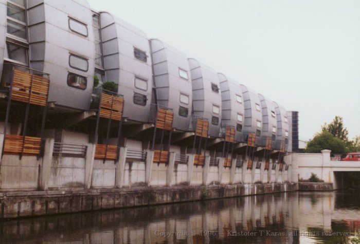 Block of flats, styled to resemble the Thames Barrier, Grand Union Canal, London