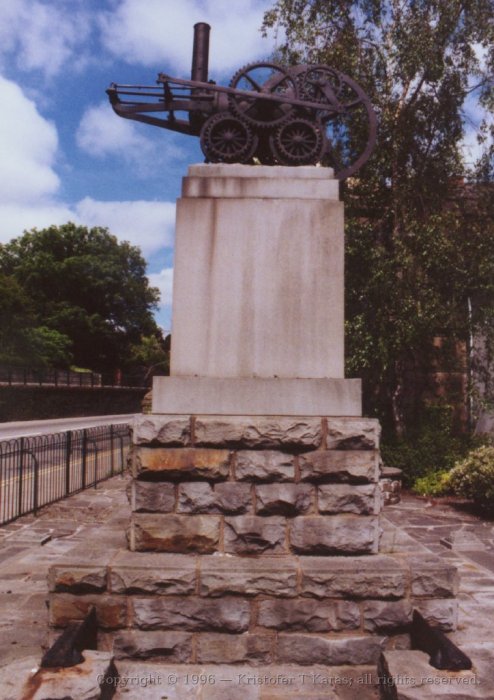 Trevithick monument side view, showing locomotive reproduction, Wales