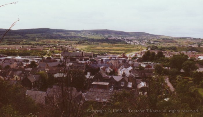Houses in foreground of Welsh valley, Wales