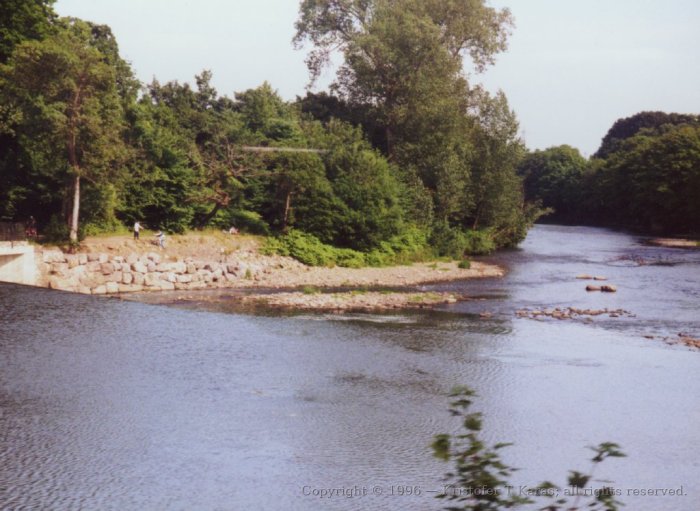 River alongside tracks from Cardiff to Merthyr Tydfil, Wales
