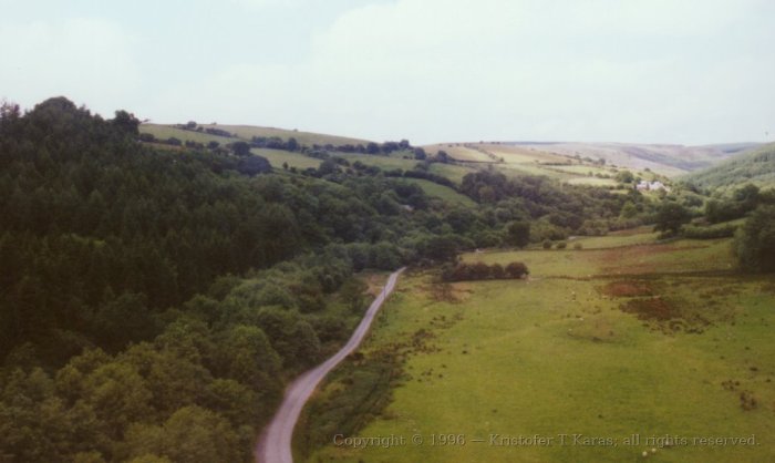 Hilly downs seen from Heart of Wales line