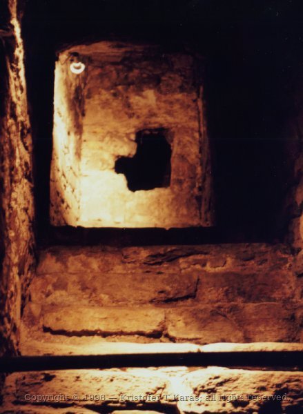 Partly-sealed stairway to places unknown, below Edinburgh Castle, Scotland