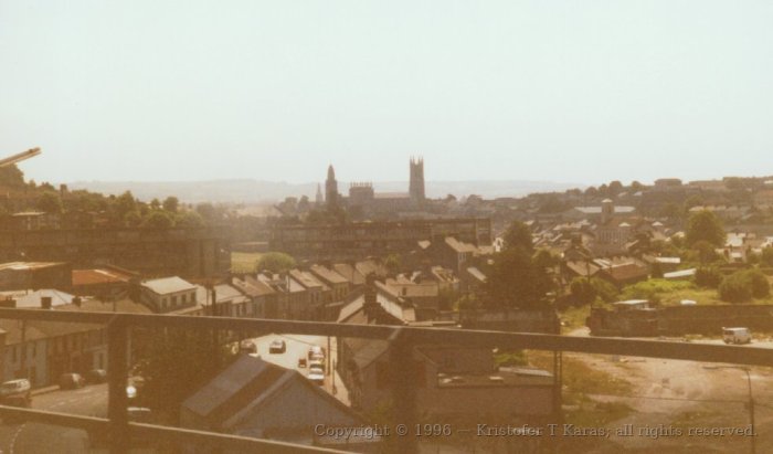 Outskirts of Cork City and a cathedral come into view; Ireland