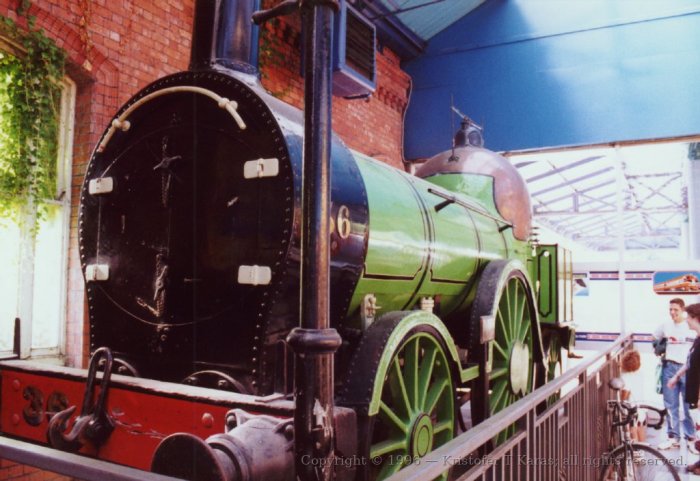 Early locomotive on display in Cork railway station, Ireland