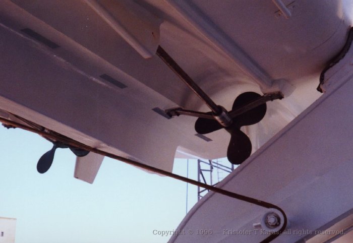 Lifeboat and propellers, seen from below; QE2