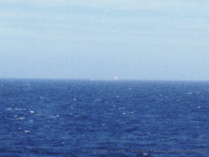 Another ship plying the Atlantic is spotted from the QE2