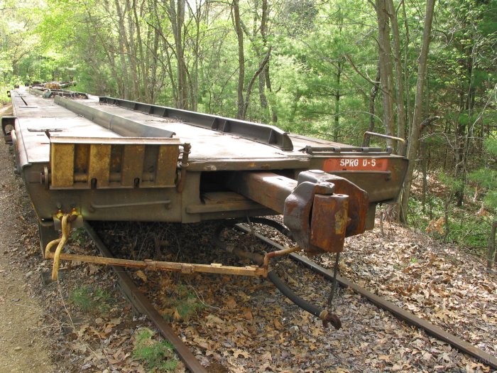 The end of a flatcar stored on the Massachusetts Central ROW