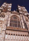 Centered, skyward looking view of front of Westminster Abbey, London