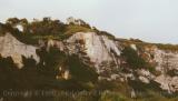 Overgrown white cliff with fortification, Dover, England