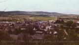 Houses in foreground of Welsh valley, Wales