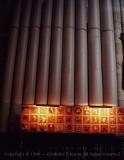 Organ pipes and illuminated tiles, York Minster, England