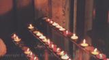 More lit votive candles at York Minster, England