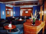 Lounge aboard the QE2, with piano from the Queen Mary