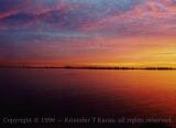 Sunrise against the New York coastline, as seen from the QE2